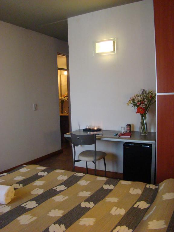 Hotel Necof Rosario Rom bilde